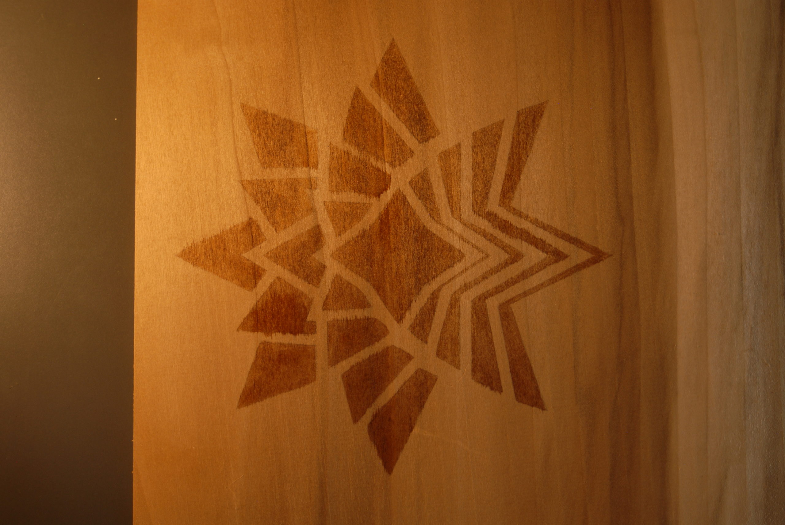 hail logo on stained wood