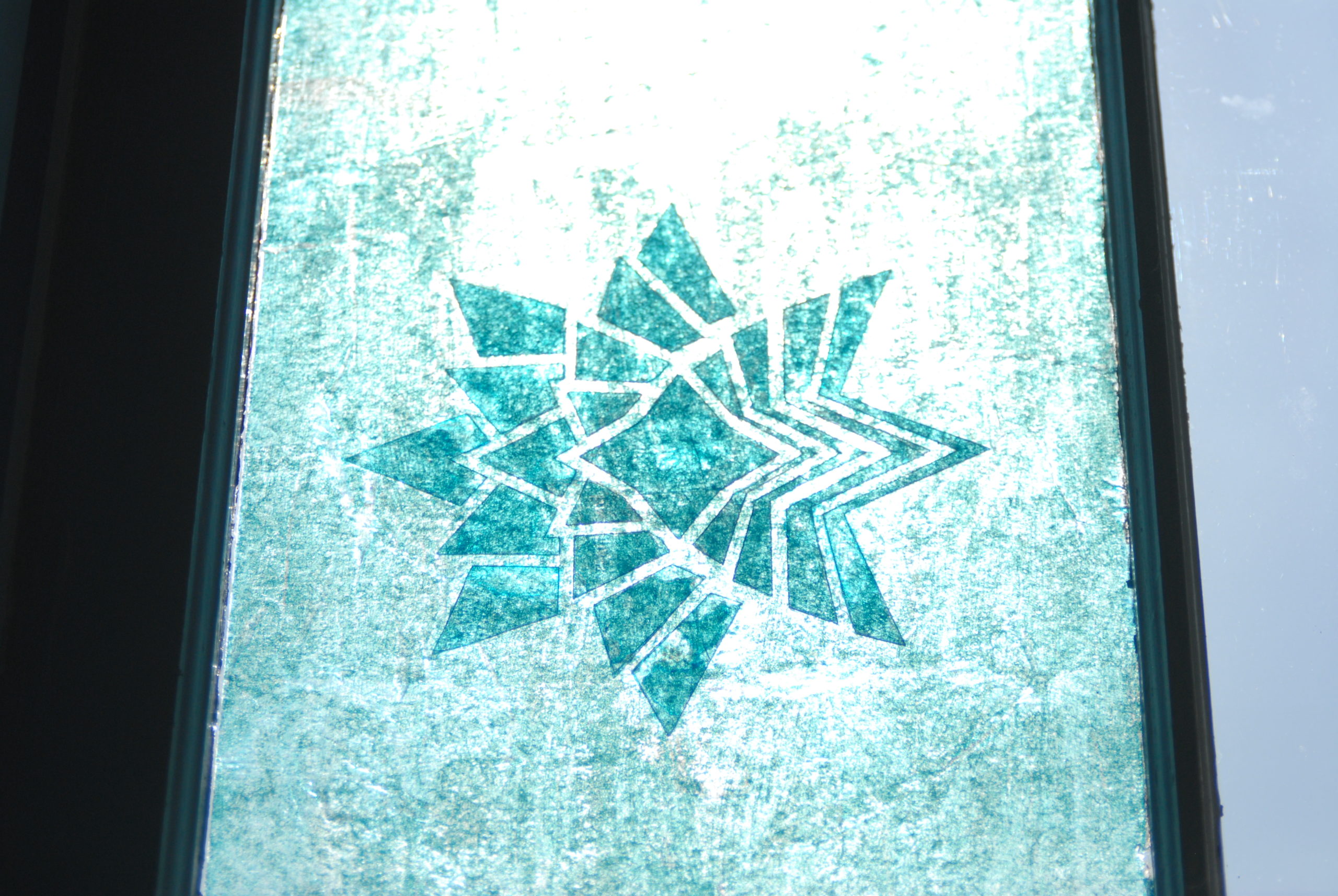 hail logo as (fake) stained glass